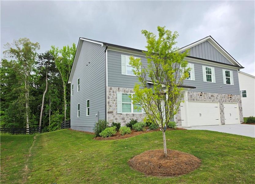 Front exterior of a new home in , Villa Rica, GA, highlighting curb appeal (Image 16).
