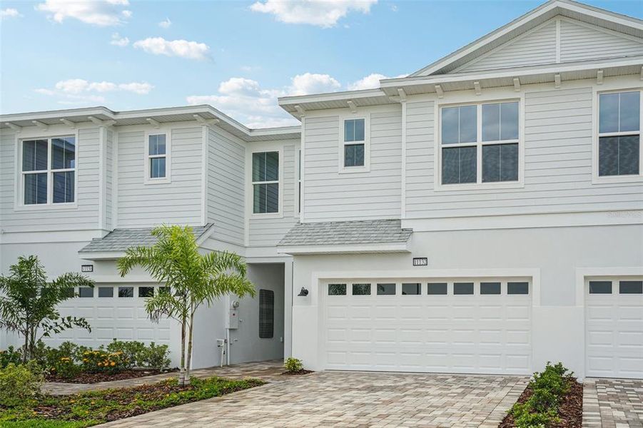 Front exterior of a new home in Isla Mirada, San Antonio, FL, highlighting curb appeal (Image 23).