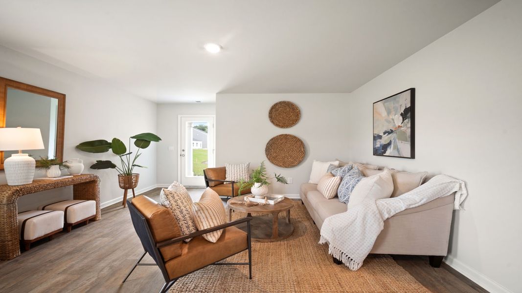Representative furnished interior of a home built from the Downing by D.R. Horton in Palm Ridge, Guyton (Image 5).