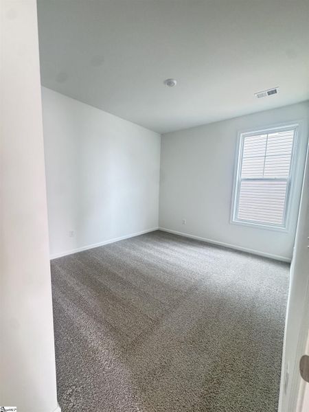 Spacious, unfurnished interior of a new home in Halton Oaks, Spartanburg (Image 17).