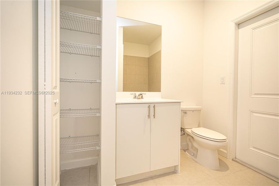 Furnished interior view inside a new home in Acacia Groves, Miami (Image 10).