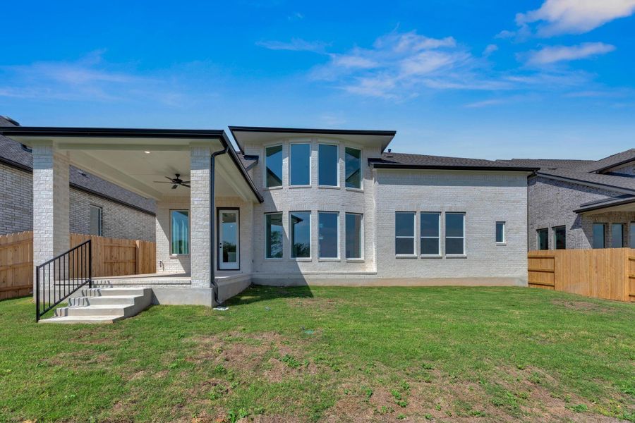 Front exterior of a new home in Flora - 60', Hutto, TX, highlighting curb appeal (Image 19).