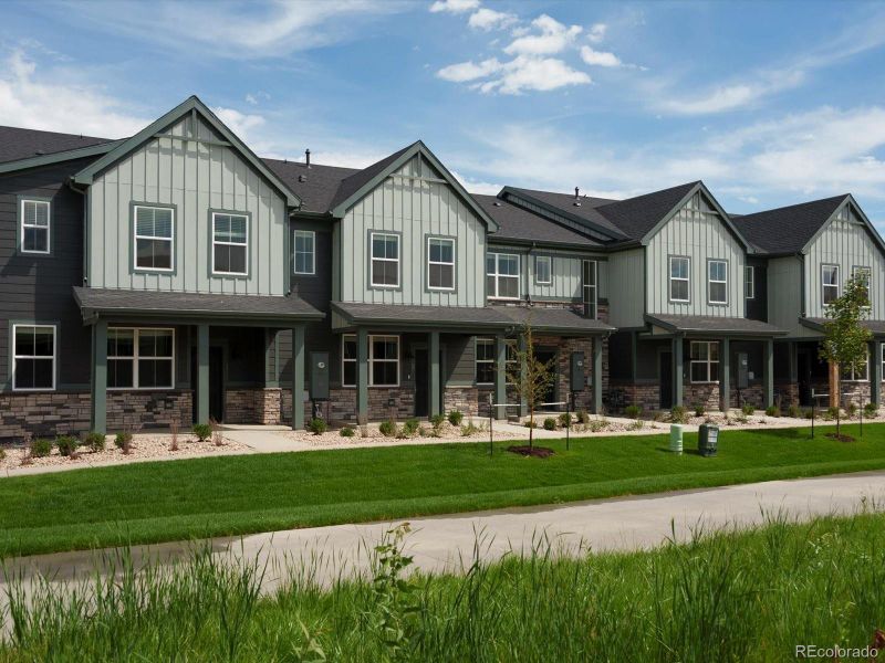 Front exterior of a new home in Poudre Heights: The Meadow Collection, Windsor, CO, highlighting curb appeal (Image 19).