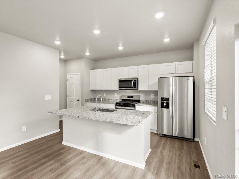Furnished interior view inside a new home in Lake Bluff, Greeley (Image 5).