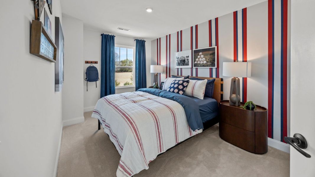 The Rochester Plan by DRB homes spacious secondary bedroom in Charlotte, NC.