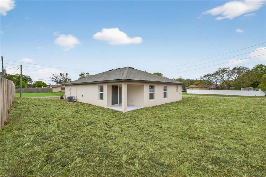 Exterior details and patio area of a home in , Spring Hill (Image 25). Exterior details and patio area of a home in , Spring Hill (Image 25).