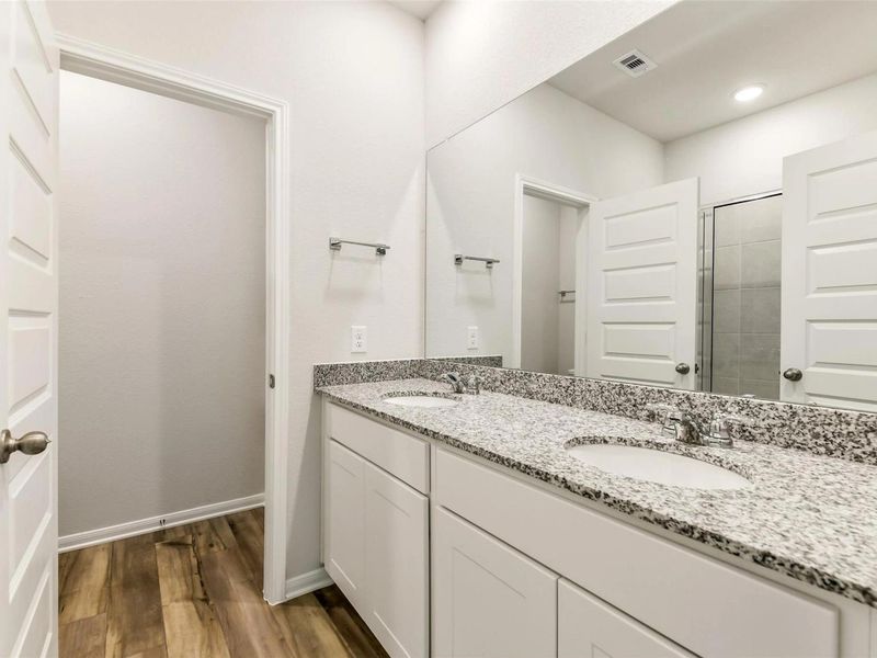 Furnished interior view inside a new home in Caney Creek Place, Conroe (Image 9).
