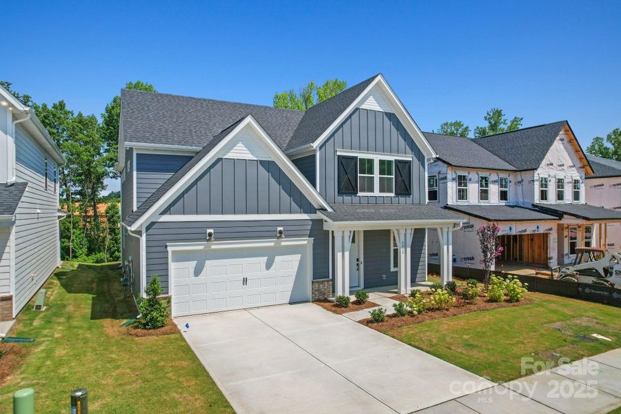Front exterior of a new home in Cannon Run, Concord, NC, highlighting curb appeal (Image 20). Front exterior of a new home in Cannon Run, Concord, NC, highlighting curb appeal (Image 20).