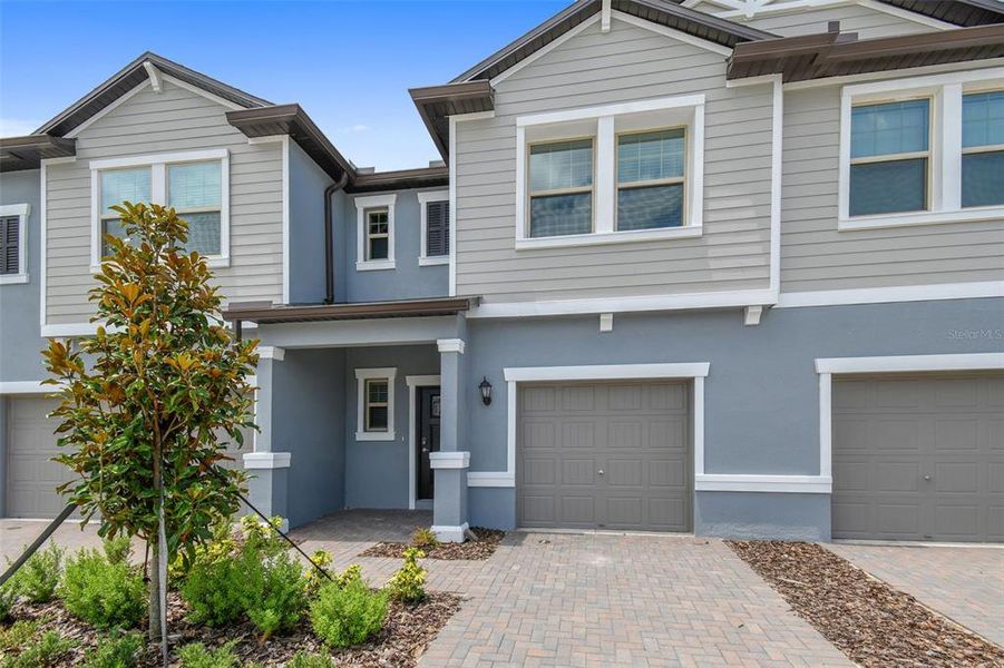 Exterior details and patio area of a home in , Land O' Lakes (Image 29).