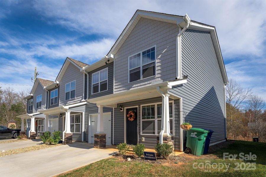 Front exterior of a new home in , Arden, NC, highlighting curb appeal (Image 22).