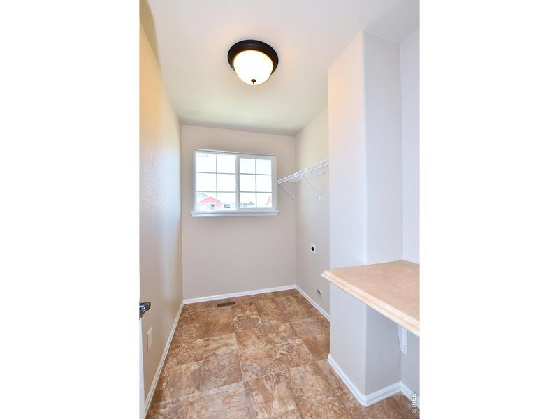 Spacious, unfurnished interior of a new home in Union Colony West, Greeley (Image 23).