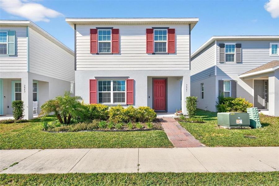 Front exterior of a new home in , Apopka, FL, highlighting curb appeal (Image 2). Front exterior of a new home in , Apopka, FL, highlighting curb appeal (Image 2).