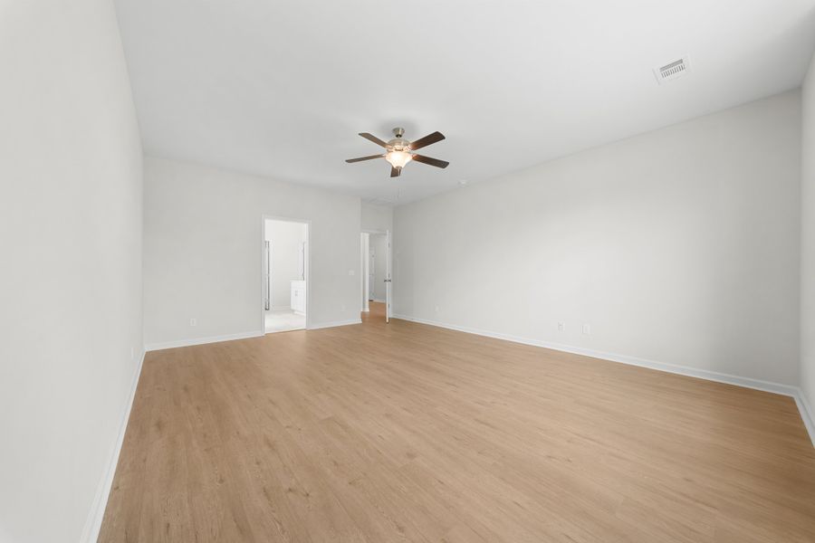 Representative unfurnished interior of a home built from the The Madison by Smith Family Homes in Camden Crossing, Savannah (Image 24).