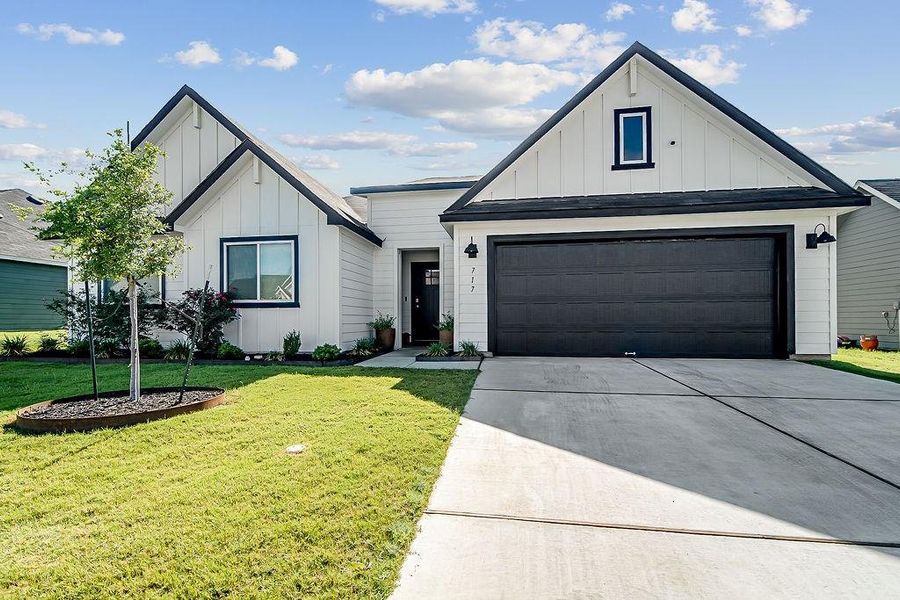 Front exterior of a new home in , Fredericksburg, TX, highlighting curb appeal (Image 20). Front exterior of a new home in , Fredericksburg, TX, highlighting curb appeal (Image 20).