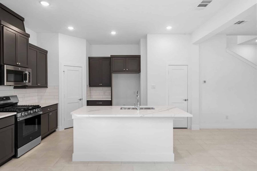 Furnished interior view inside a new home in Bridgeland, Cypress (Image 9).