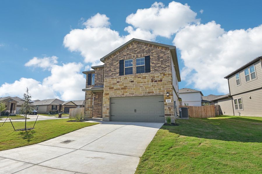 Front exterior of the Medina floorplan at a Meritage Homes community.