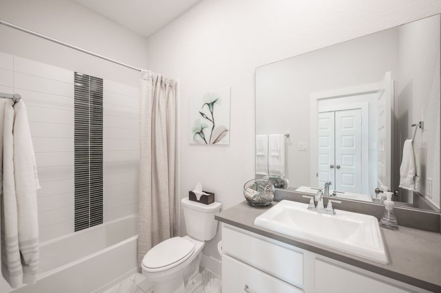 Representative furnished interior of a home built from the Goldeneye by Tri Pointe Homes in Jubilee 50′, Hockley (Image 5).