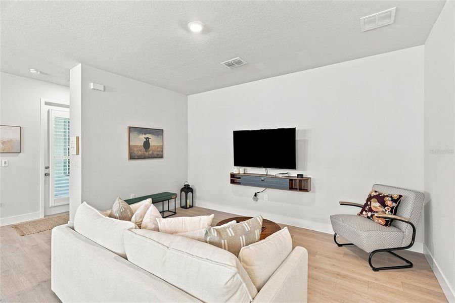 Furnished interior view inside a new home in SeaFlower – Bungalow Homes, Bradenton (Image 17).