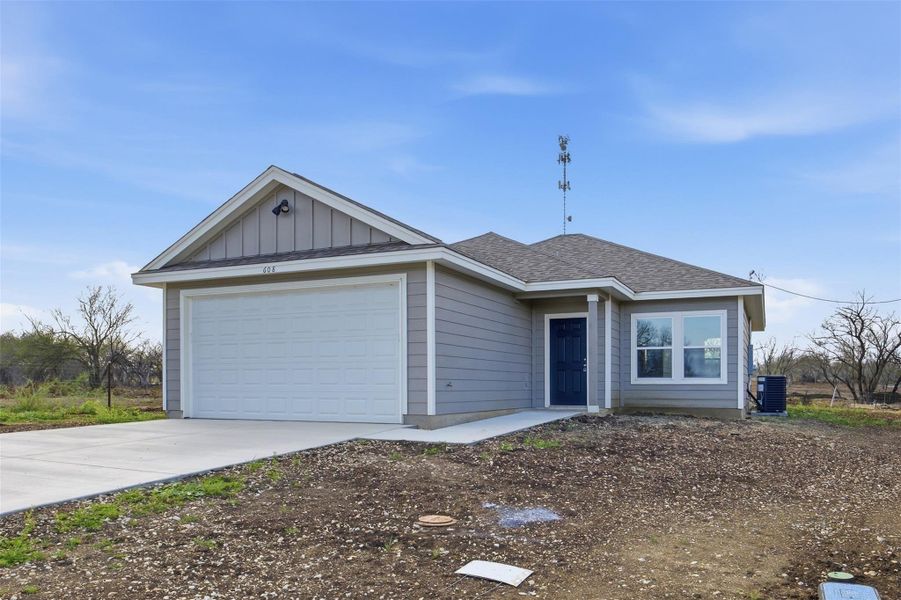 Front exterior of a new home in , Nixon, TX, highlighting curb appeal (Image 1). Front exterior of a new home in , Nixon, TX, highlighting curb appeal (Image 1).