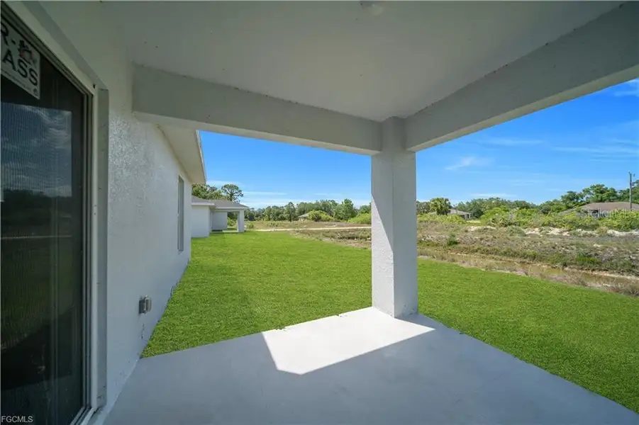 Exterior details and patio area of a home in , Lehigh Acres (Image 3).