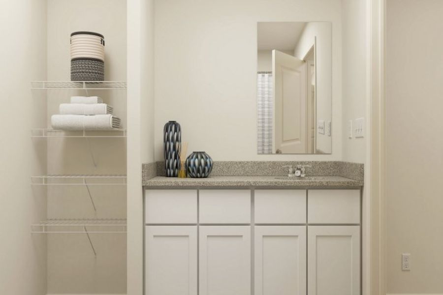A bathroom with a mirror and a shelf. A bathroom with a mirror and a shelf.