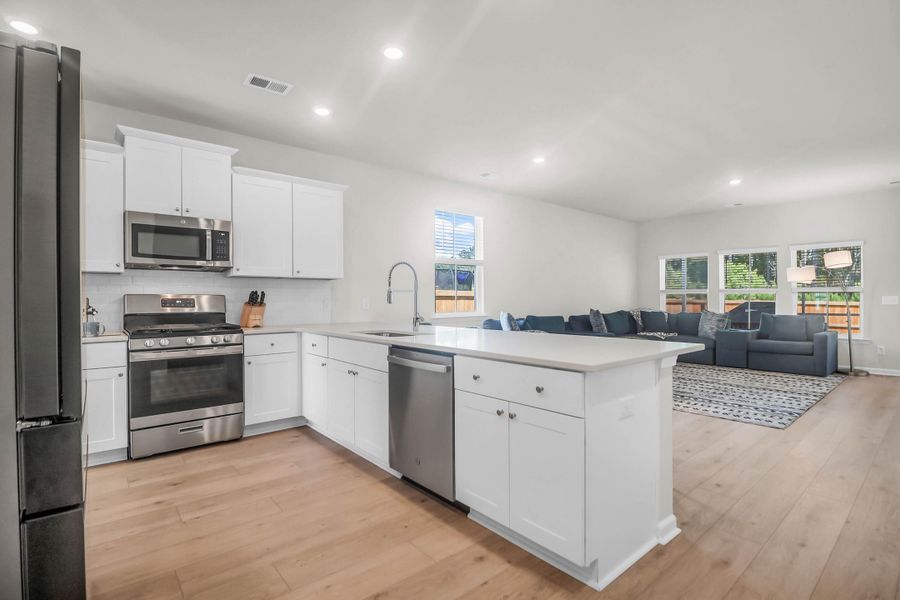 Furnished interior view inside a new home in Sweetgrass at Summers Corner: Arbor Collection, Summerville (Image 14).