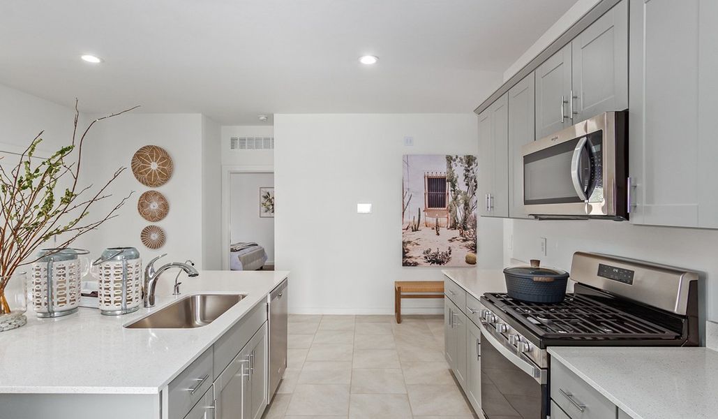 Representative furnished interior of a home built from the Kingston by D.R. Horton in Barnett Village, Marana (Image 25).