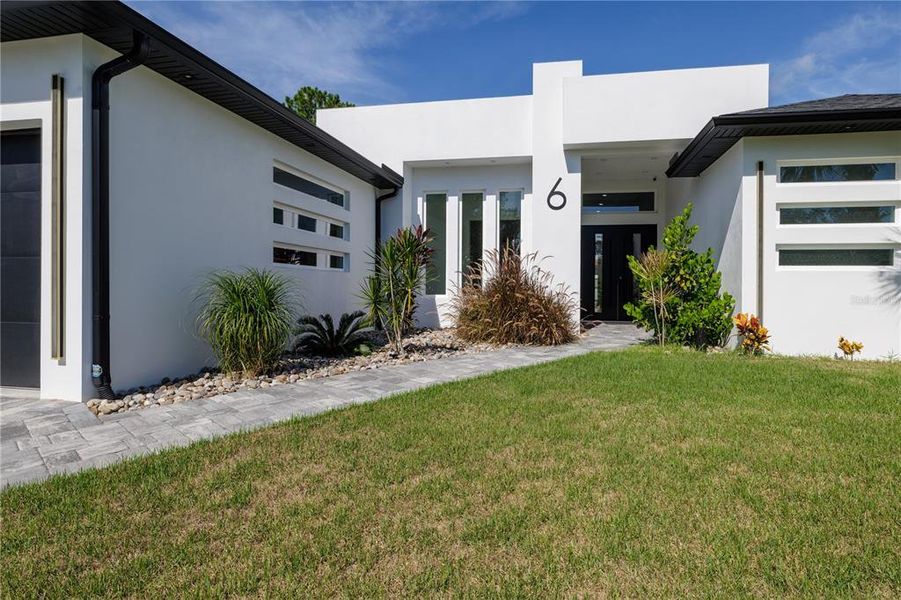 Exterior details and patio area of a home in , Palm Coast (Image 39).