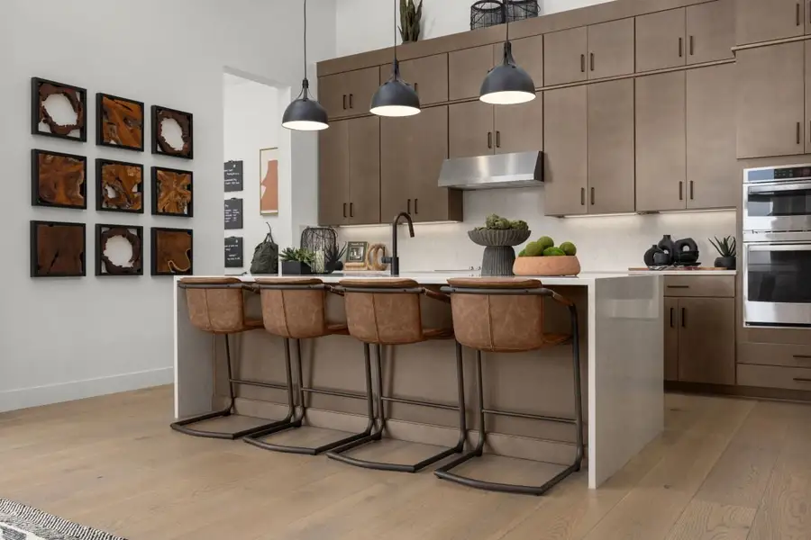 Representative furnished interior of a home built from the 2483 Modeled by KB Home in Windler Midtown Starlight, Aurora (Image 9).