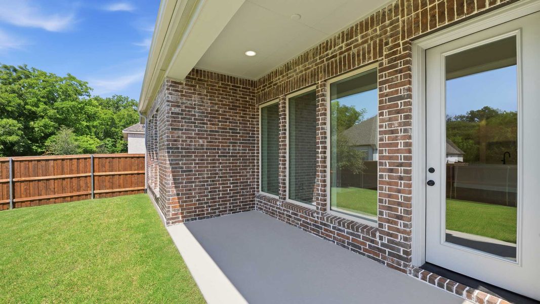 Exterior details and patio area of a home in Trinity Falls, McKinney (Image 3).