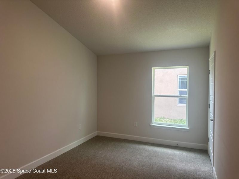 Spacious, unfurnished interior of a new home in St. John Preserve, Palm Bay (Image 11). Spacious, unfurnished interior of a new home in St. John Preserve, Palm Bay (Image 11).