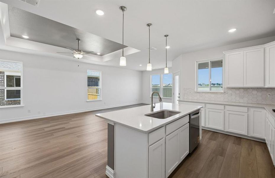 Kitchen with eat-in bartop island