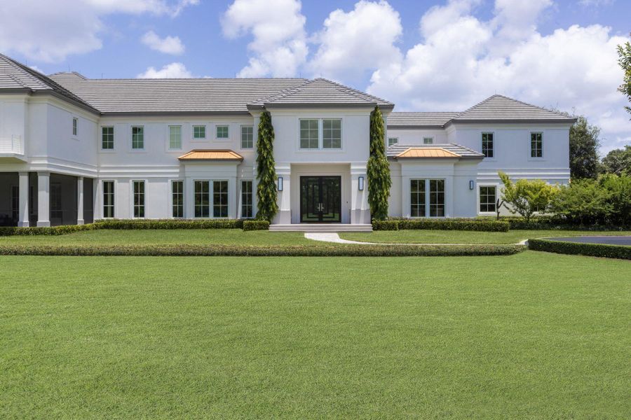 Front exterior of a new home in , Wellington, FL, highlighting curb appeal (Image 30). Front exterior of a new home in , Wellington, FL, highlighting curb appeal (Image 30).