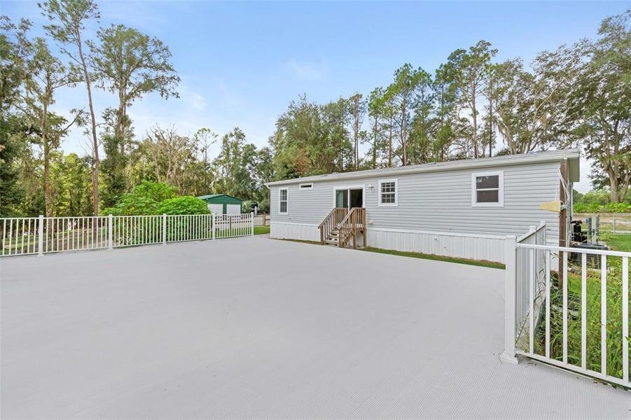 Exterior details and patio area of a home in , Brooksville (Image 35).