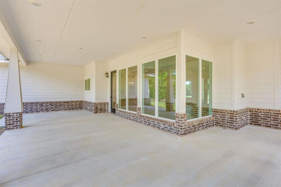 Exterior details and patio area of a home in , Sunset (Image 4).
