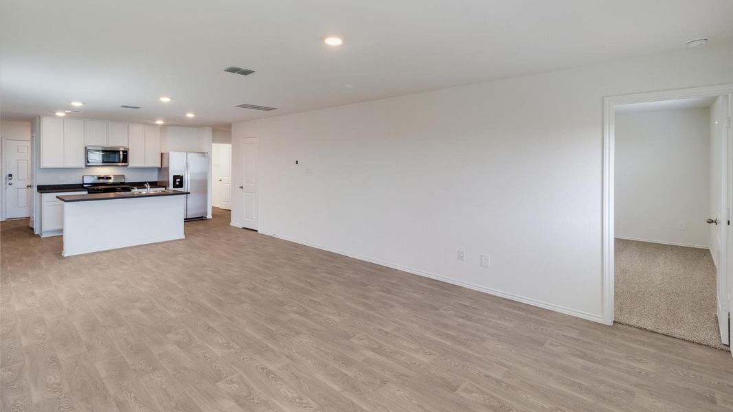 Spacious, unfurnished interior of a new home in Wayside, Uhland (Image 14).