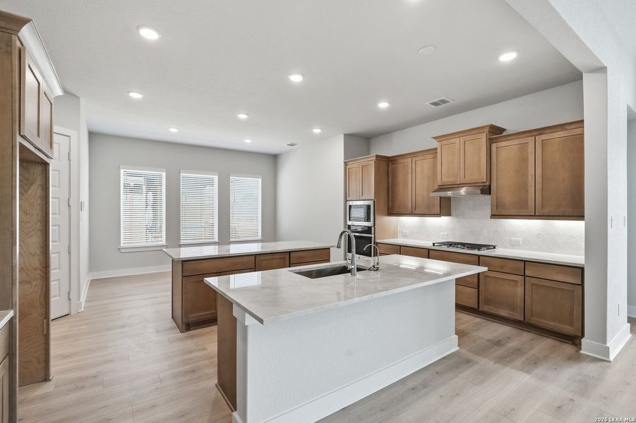 Furnished interior view inside a new home in Potranco Oaks, Castroville (Image 6).