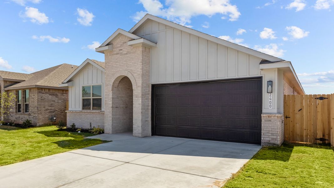 Front exterior of a new home in Homestead at Parks Bell Ranch, Odessa, TX, highlighting curb appeal (Image 16).