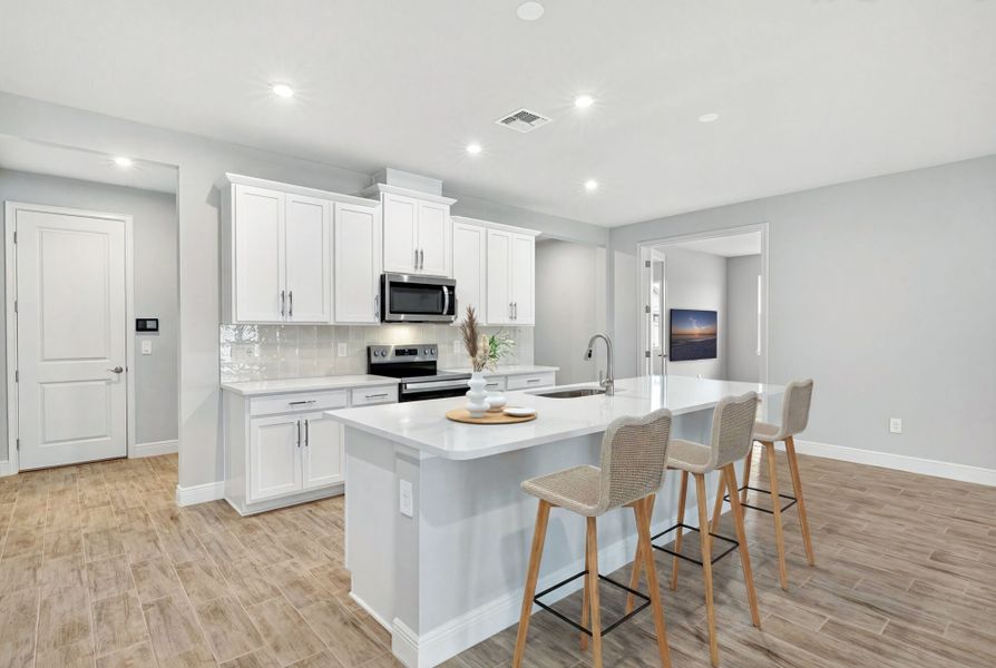 Furnished interior view inside a new home in Windwater, Parrish (Image 5).