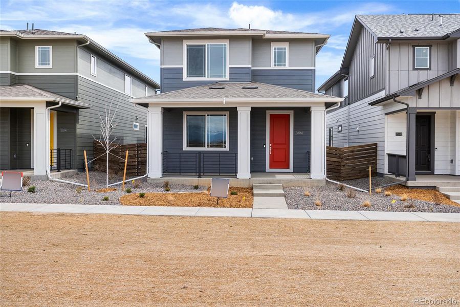 Exterior details and patio area of a home in Barefoot Village, Firestone (Image 23).