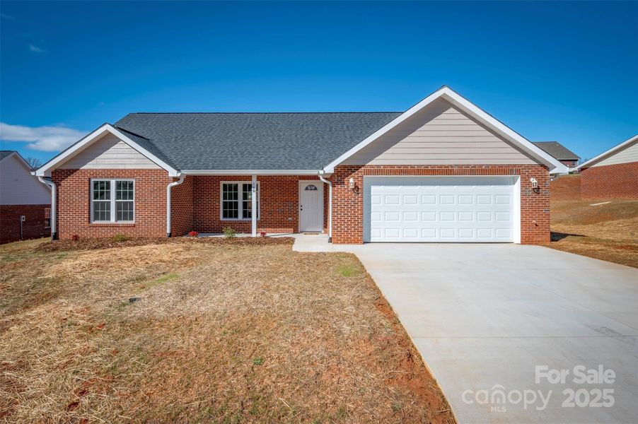 Front exterior of a new home in , Spindale, NC, highlighting curb appeal (Image 19).
