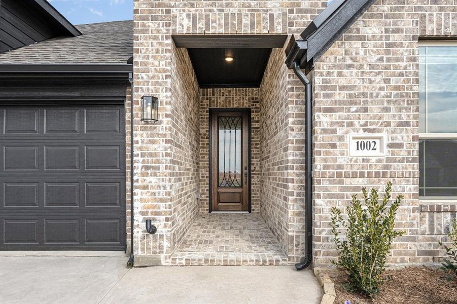 Exterior details and patio area of a home in Timberbrook, Justin (Image 4). Exterior details and patio area of a home in Timberbrook, Justin (Image 4).