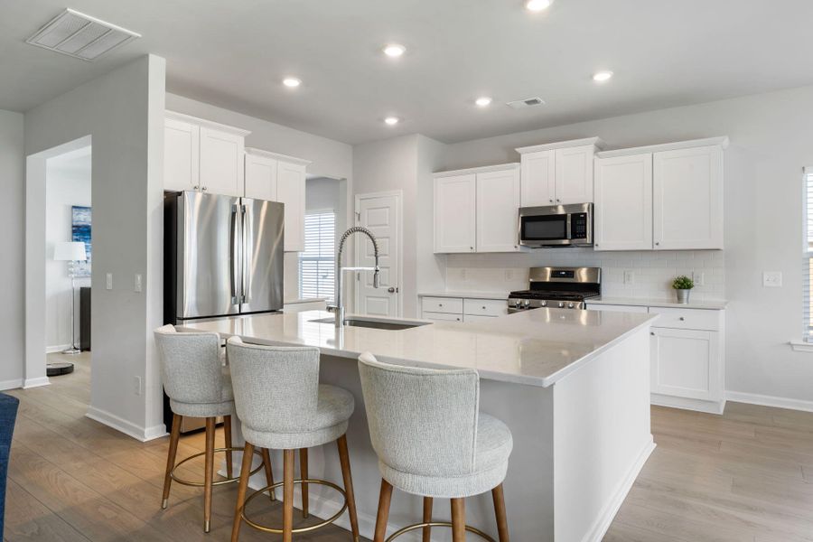 Furnished interior view inside a new home in Sweetgrass at Summers Corner: Arbor Collection, Summerville (Image 13). Furnished interior view inside a new home in Sweetgrass at Summers Corner: Arbor Collection, Summerville (Image 13).