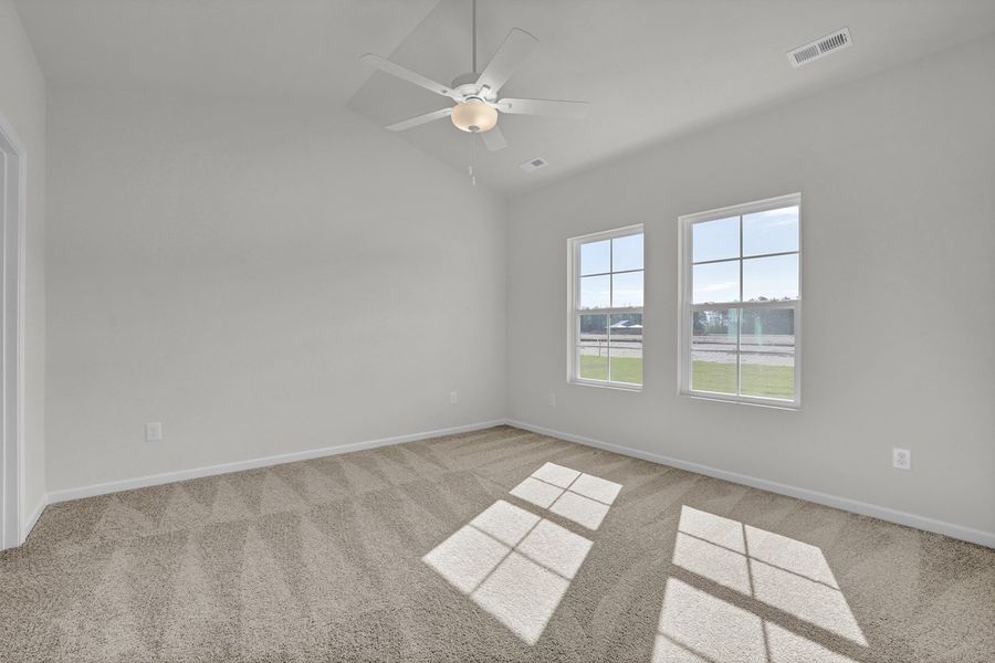 Spacious, unfurnished interior of a new home in River Tide Farms, Bolivia (Image 16).
