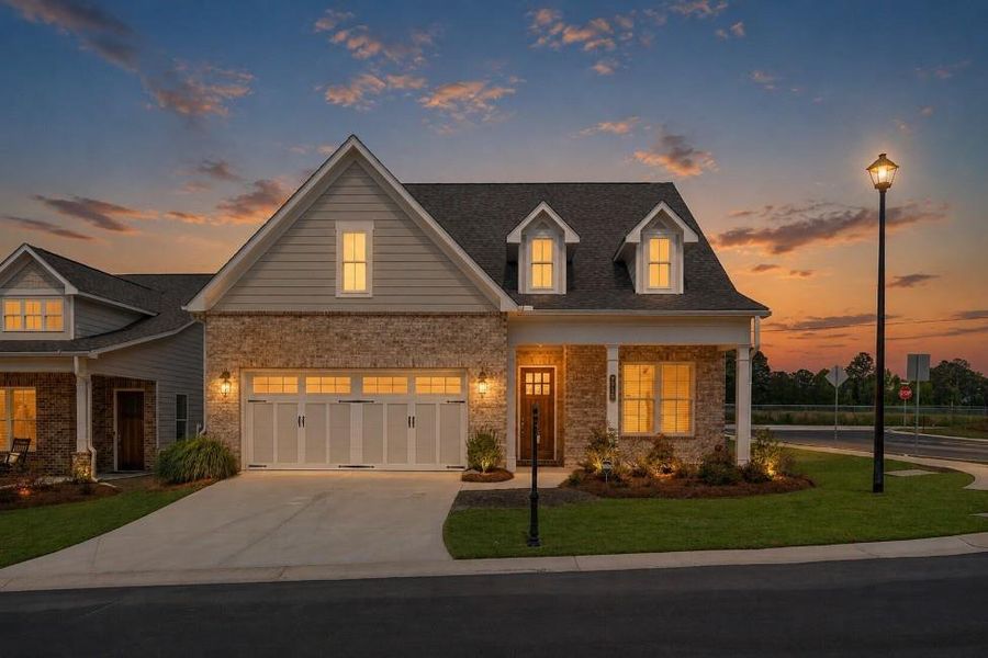 Front exterior of a new home in Courtyards at Traditions, Cumming, GA, highlighting curb appeal (Image 20).