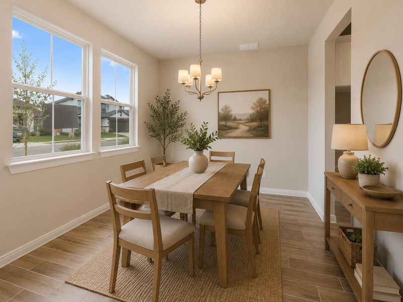 Natural light floods this inviting dining space, featuring elegant wood-look flooring. Natural light floods this inviting dining space, featuring elegant wood-look flooring.