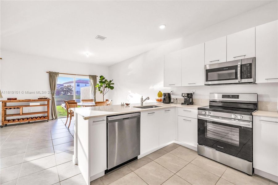 Furnished interior view inside a new home in Westview: Nantucket Collection, Miami (Image 8). Furnished interior view inside a new home in Westview: Nantucket Collection, Miami (Image 8).