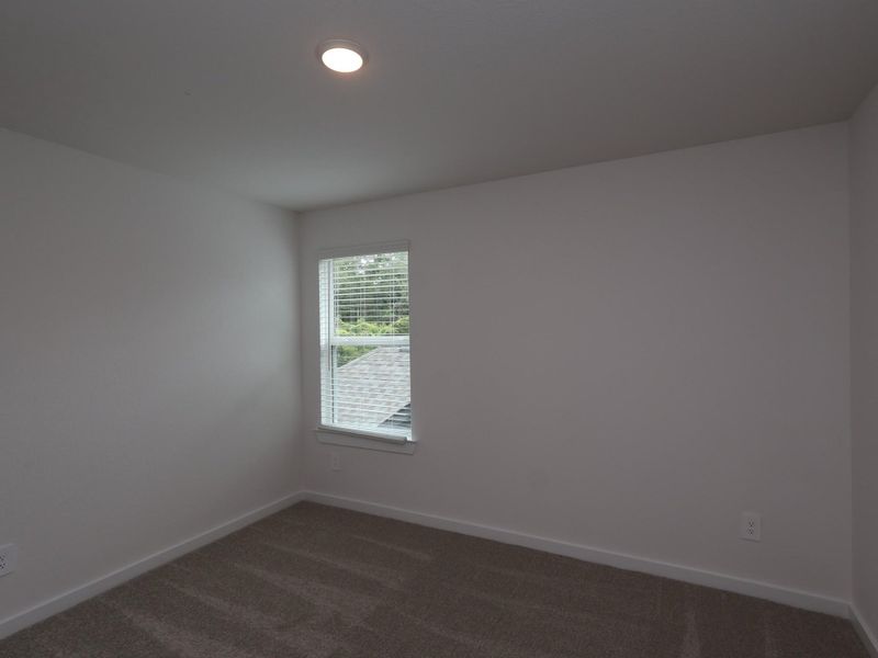 Spacious, unfurnished interior of a new home in Sorella, Tomball (Image 17).
