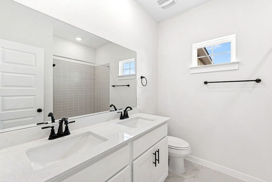 Furnished interior view inside a new home in University Heights, Round Rock (Image 12).