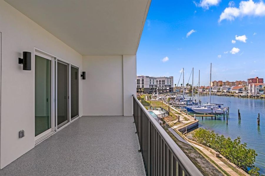 Exterior details and patio area of a home in Residences at Town Center, Madeira Beach (Image 30).